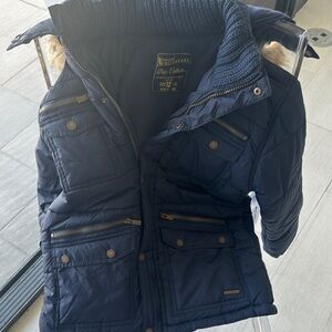 Blue Quilted Puffer Jacket with High Collar